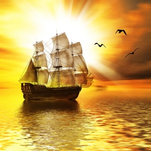 Корабль с парусами на закате с чайками