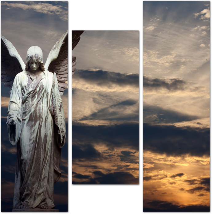 Скульптура ангела на фоне заката