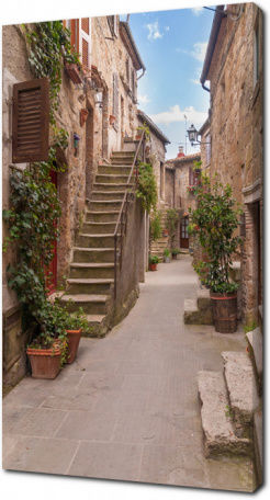 Старая улочка в деревне Тоскана. Италия