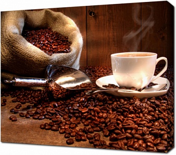 Кофейные зерна в мешке и чашка кофе