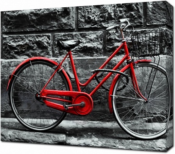 Ретро велосипед на фоне каменной стены