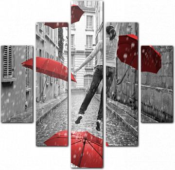 Девушка с красными зонтами летит над землей
