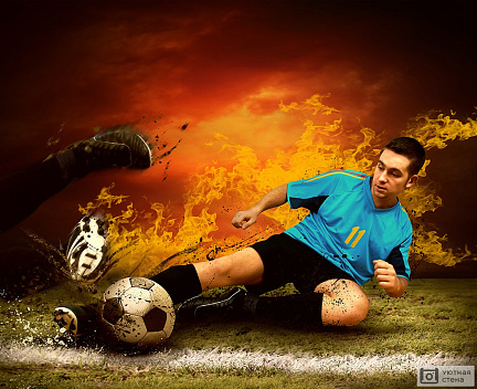 Футболист с мячом. Художественное фото