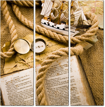 Макет корабля, старинная книга, веревка и компас