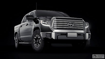 Полноразмерный пикап Toyota Tundra на черном фоне