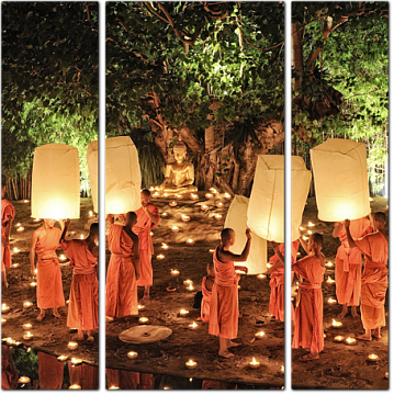 Монахи запускают фонарики в небо. Таиланд