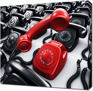 Красный роторный телефон в окружении черных