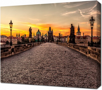Вид на Прагу на закате с Карлова моста