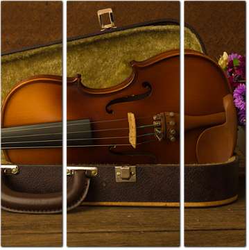 Скрипка и цветы на деревянном столе