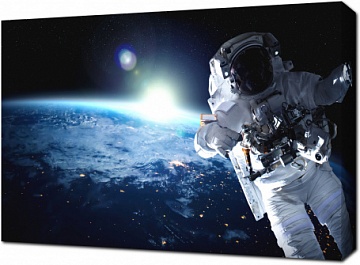 Фото космонавта на фоне Земли