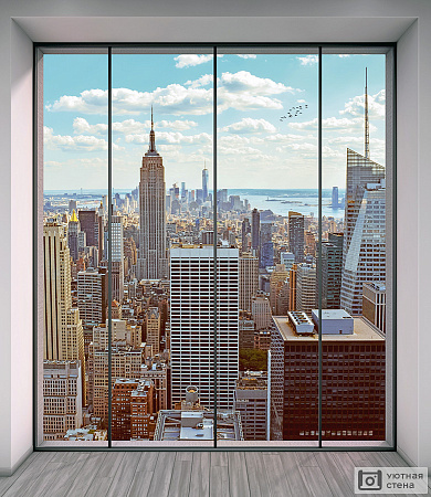 Окно с видом на дневной мегаполис