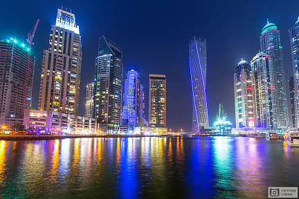 Фотообои Светящиеся в ночи небоскребы Дубай. ОАЭ